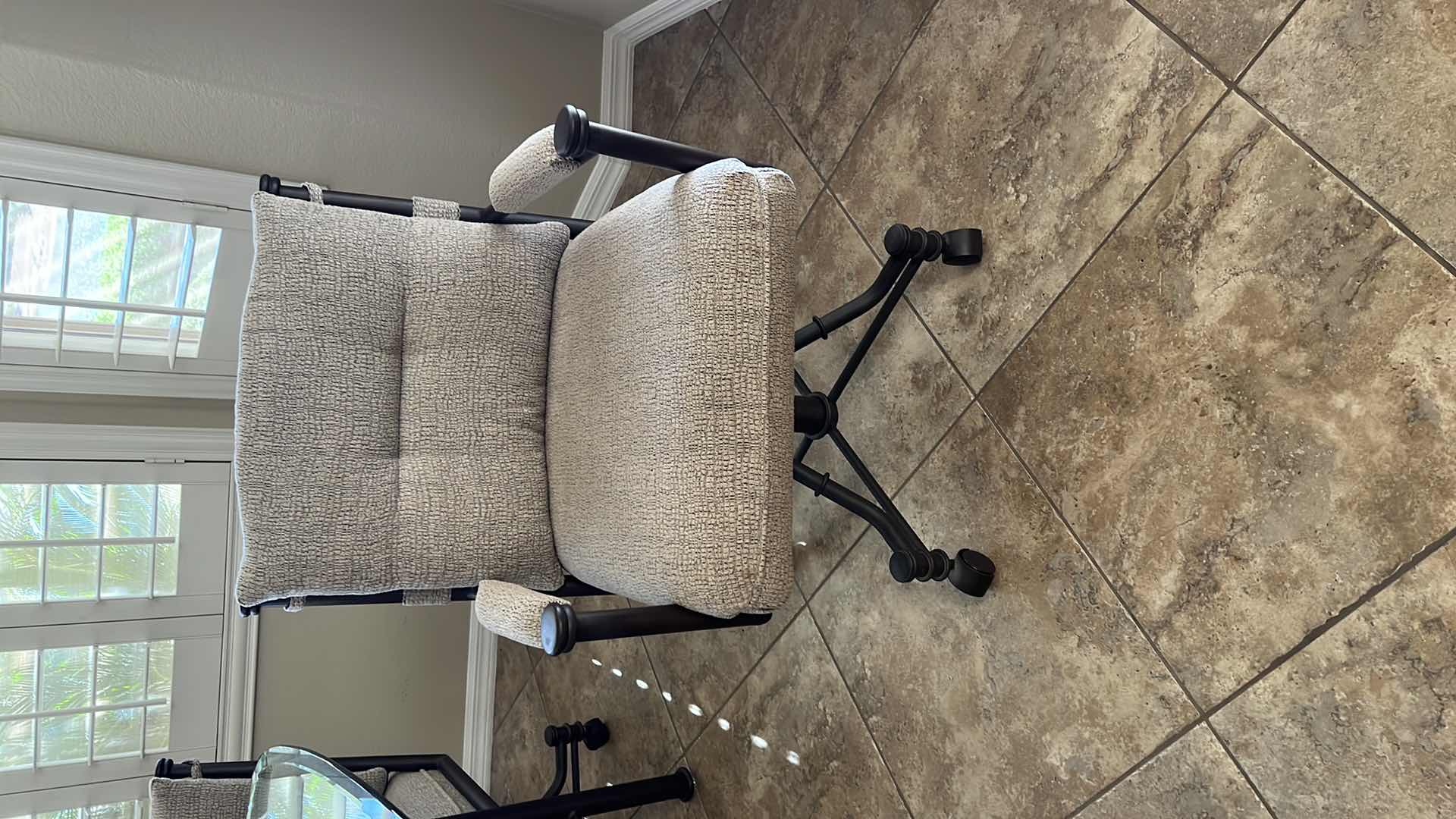 Photo 3 of WROUGHT IRON GLASSTOP TABLE W 4 WROUGHT IRON SWIVEL ROLLING CHAIRS (TABLE 50”x42” H30”)