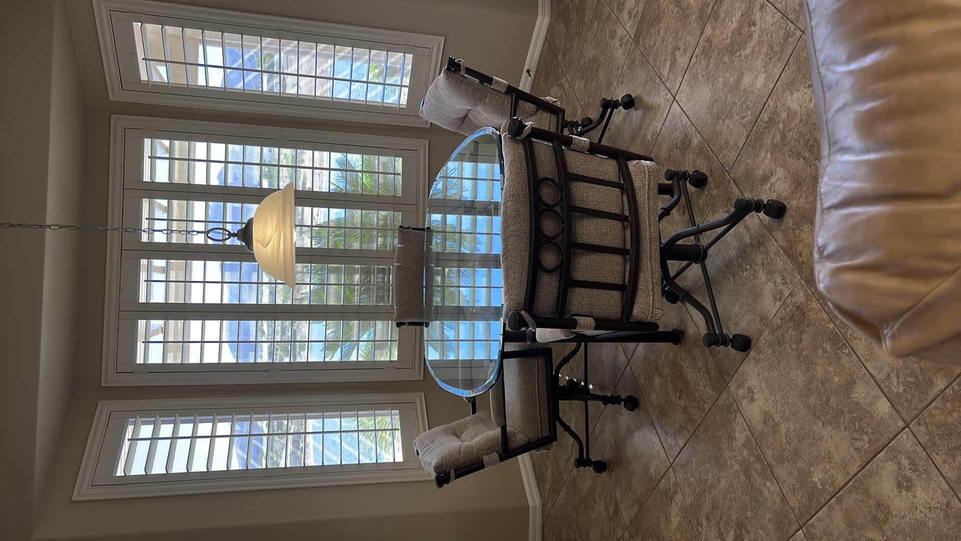 Photo 5 of WROUGHT IRON GLASSTOP TABLE W 4 WROUGHT IRON SWIVEL ROLLING CHAIRS (TABLE 50”x42” H30”)