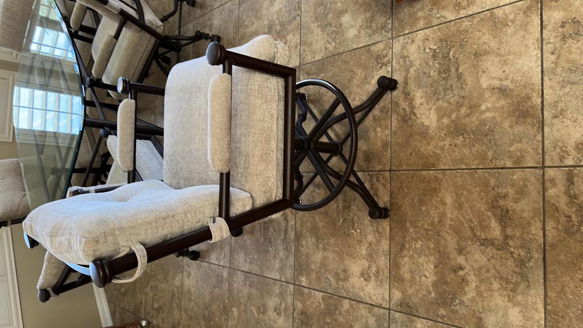 Photo 1 of WROUGHT IRON SWIVEL BAR STOOL