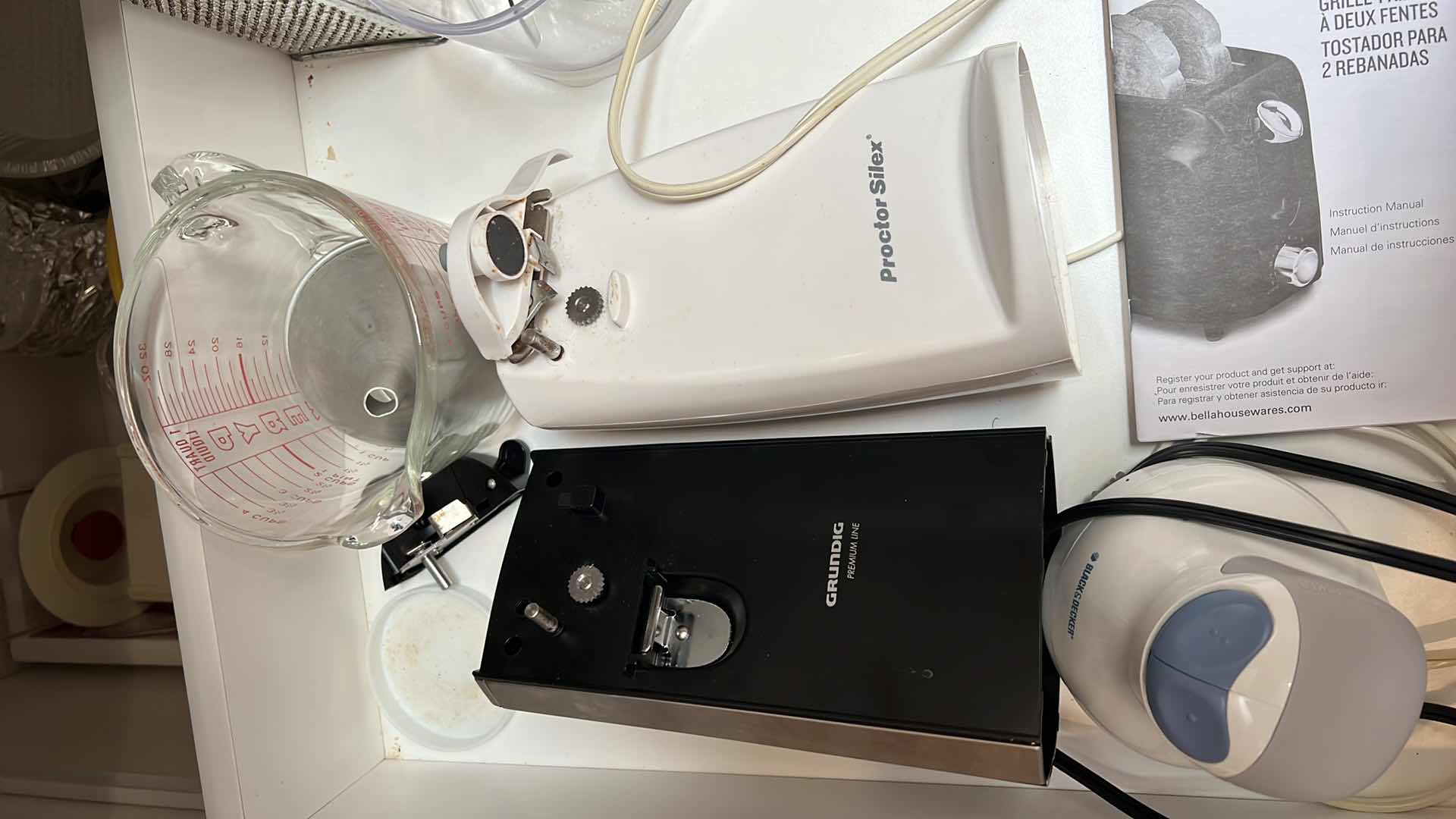 Photo 1 of CONTENTS OF KITCHEN DRAWER (MIXER, CAN OPENER)