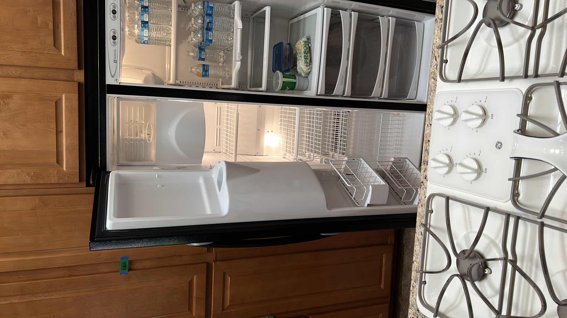 Photo 1 of BLACK MAYTAG SIDE BY SIDE REFRIGERATOR (CONTENTS NOT INCLUDED)