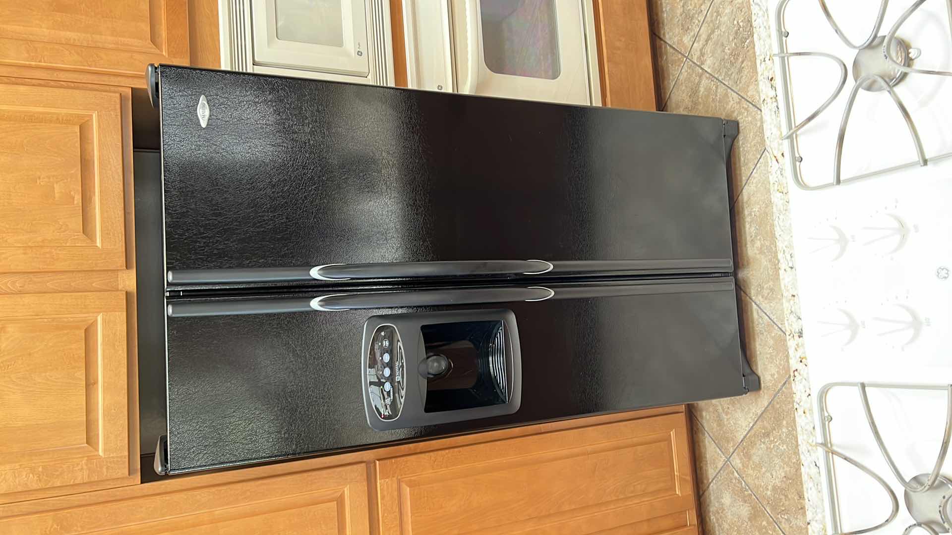 Photo 1 of BLACK MAYTAG SIDE BY SIDE REFRIGERATOR (CONTENTS NOT INCLUDED)