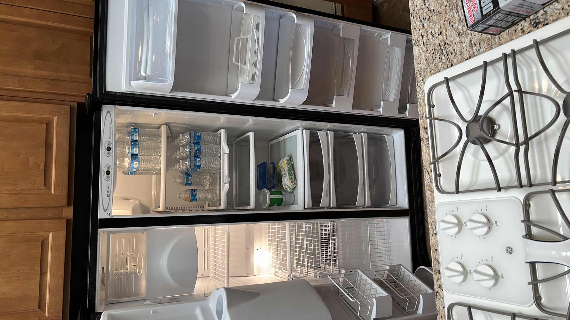 Photo 1 of BLACK MAYTAG SIDE BY SIDE REFRIGERATOR (CONTENTS NOT INCLUDED)