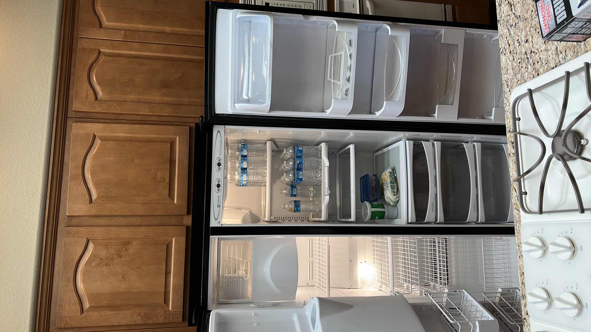 Photo 1 of BLACK MAYTAG SIDE BY SIDE REFRIGERATOR (CONTENTS NOT INCLUDED)