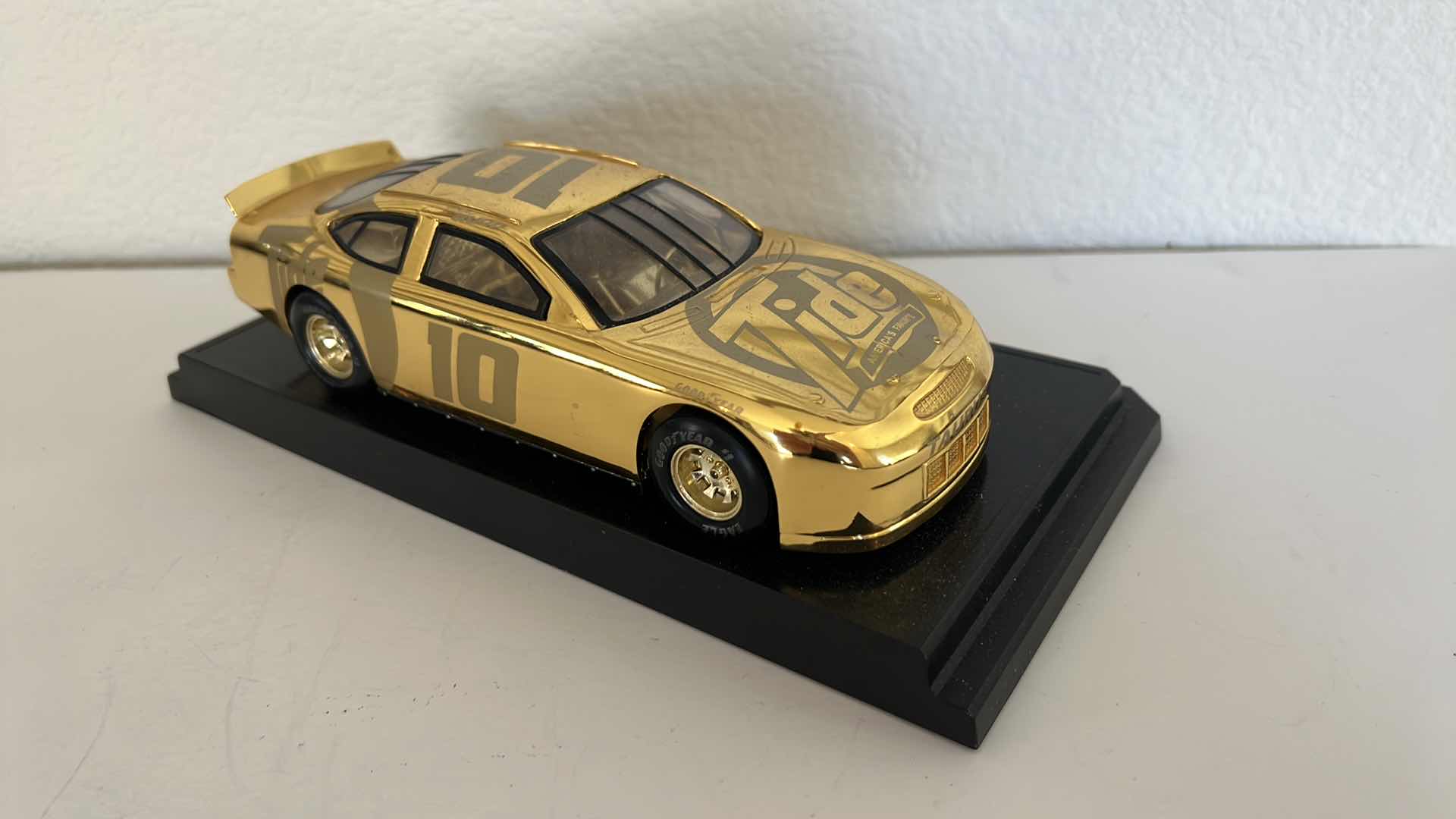 Photo 1 of FORD TAURUS NASCAR “REFLECTIONS IN GOLD” DIE CAST MODEL CAR