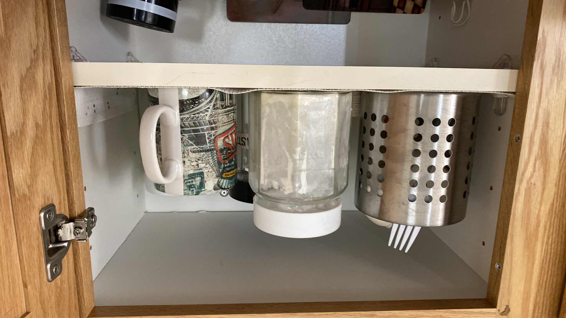 Photo 1 of CONTENTS OF KITCHEN CABINET