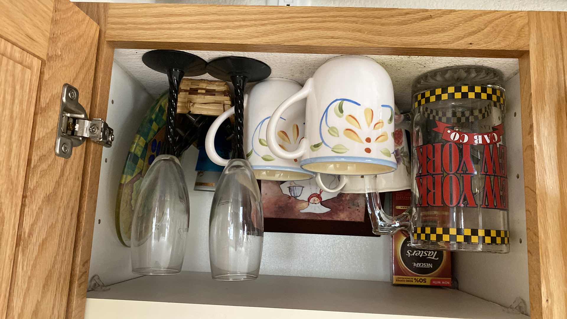 Photo 1 of CONTENTS OF KITCHEN CABINET