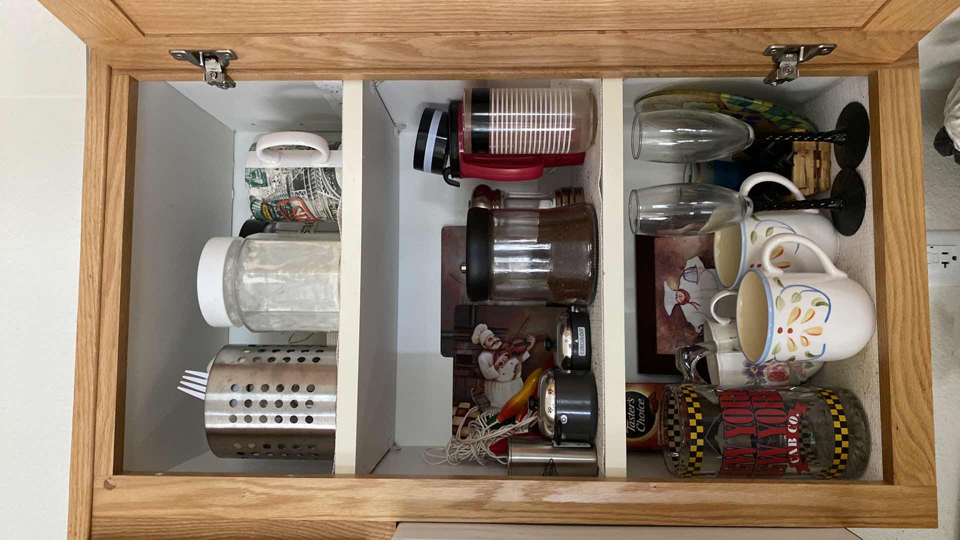 Photo 1 of CONTENTS OF KITCHEN CABINET