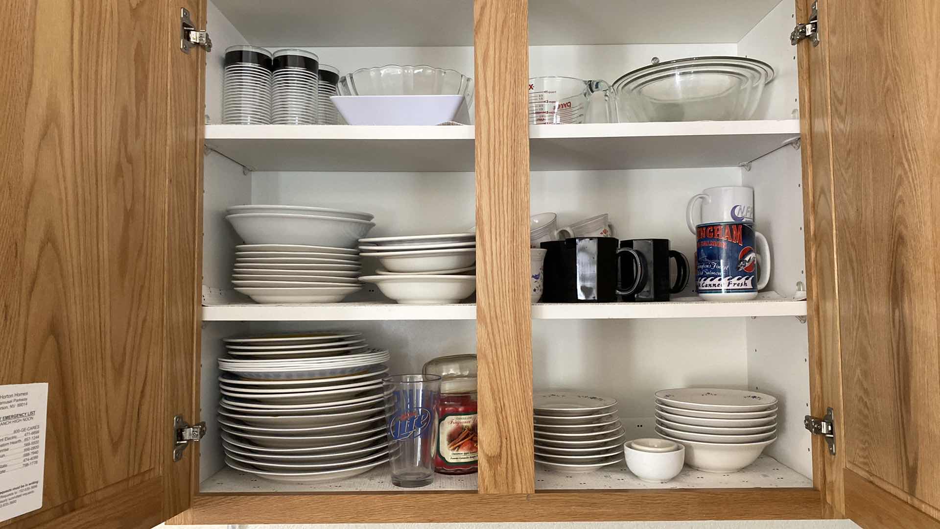 Photo 1 of CONTENTS OF KITCHEN CABINET