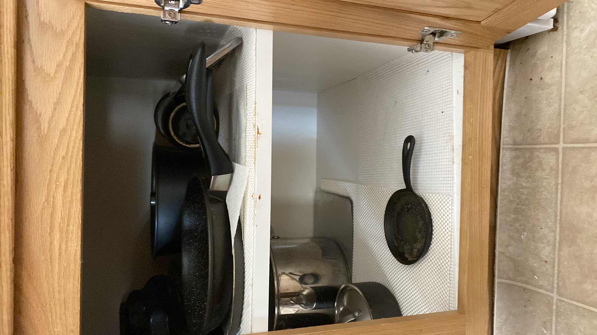 Photo 2 of CONTENTS OF KITCHEN CABINET POTS & PANS