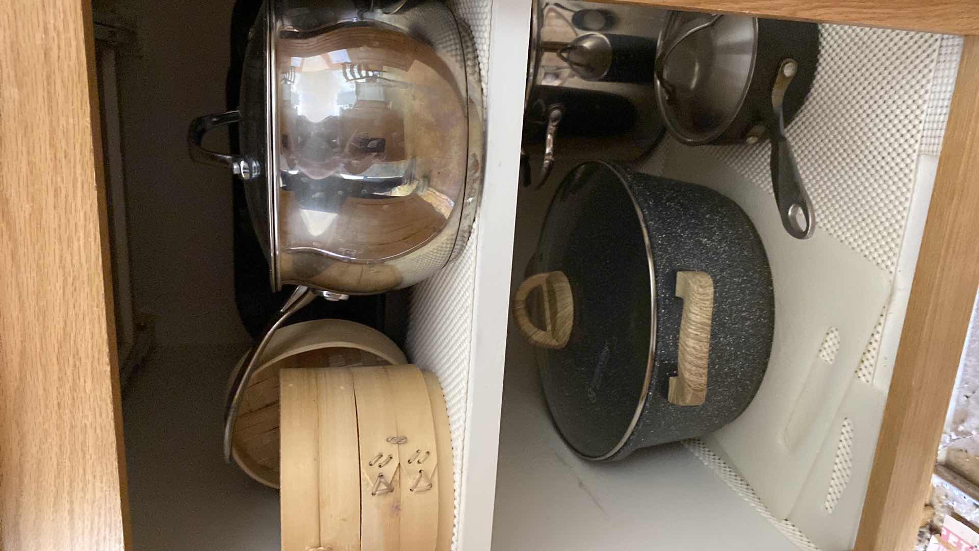 Photo 1 of CONTENTS OF KITCHEN CABINET POTS & PANS