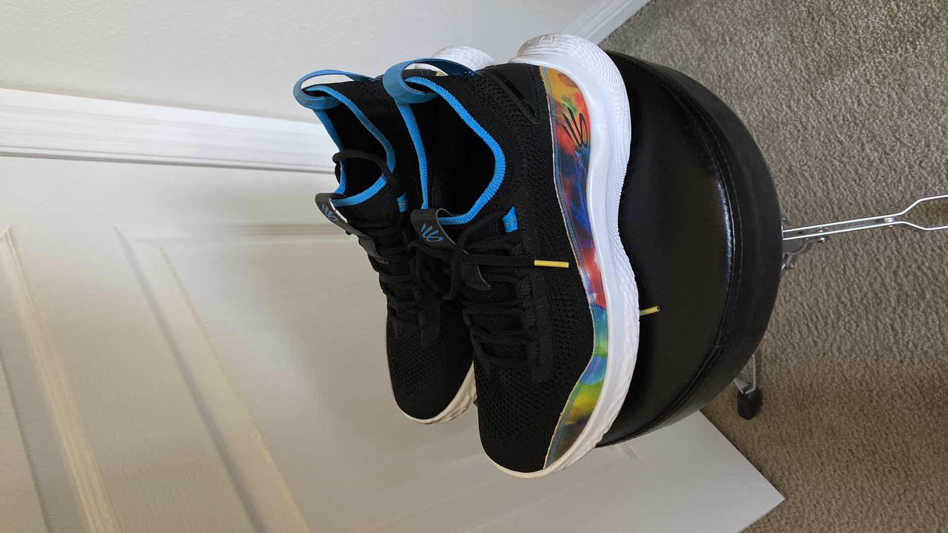 Photo 1 of MENS 9 UNDER ARMOUR CURRY