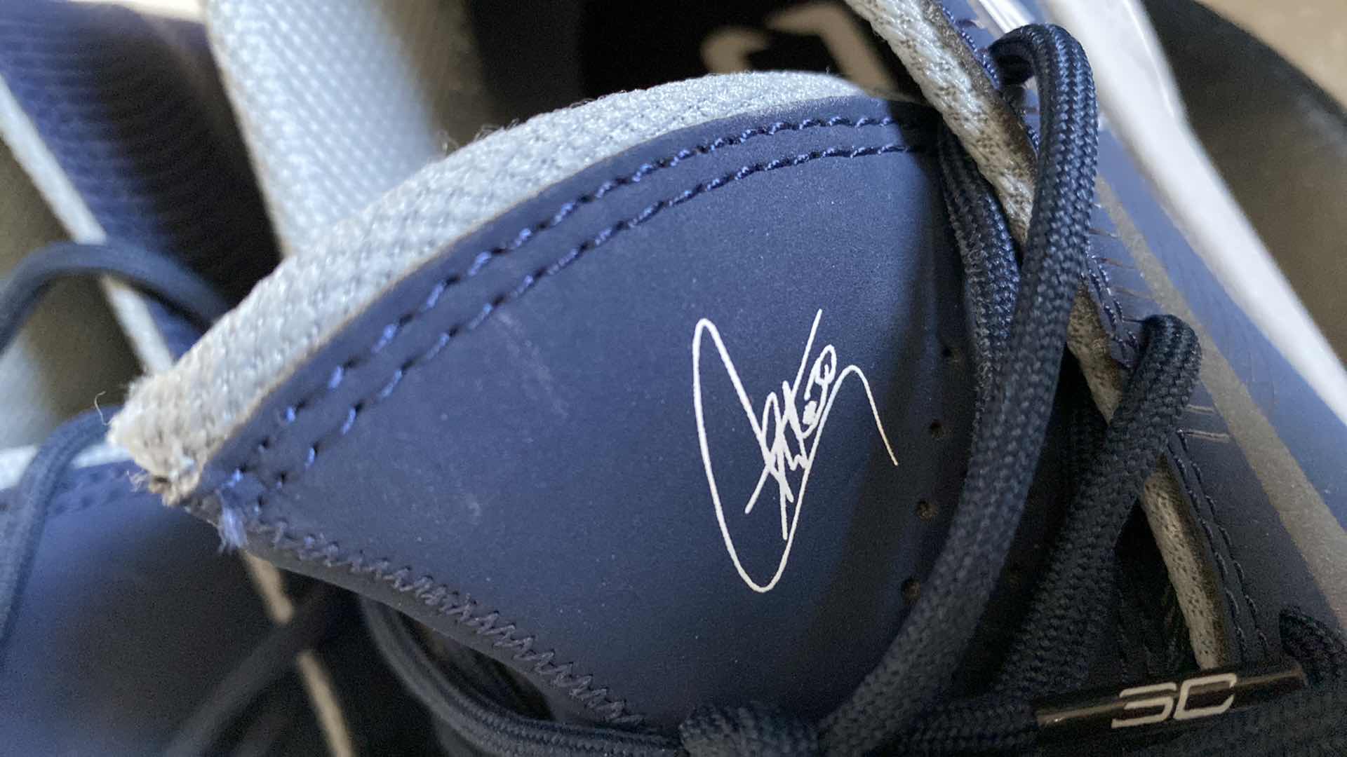 Photo 2 of MENS SIZE 9 UNDER ARMOUR SC TEAM CURRY