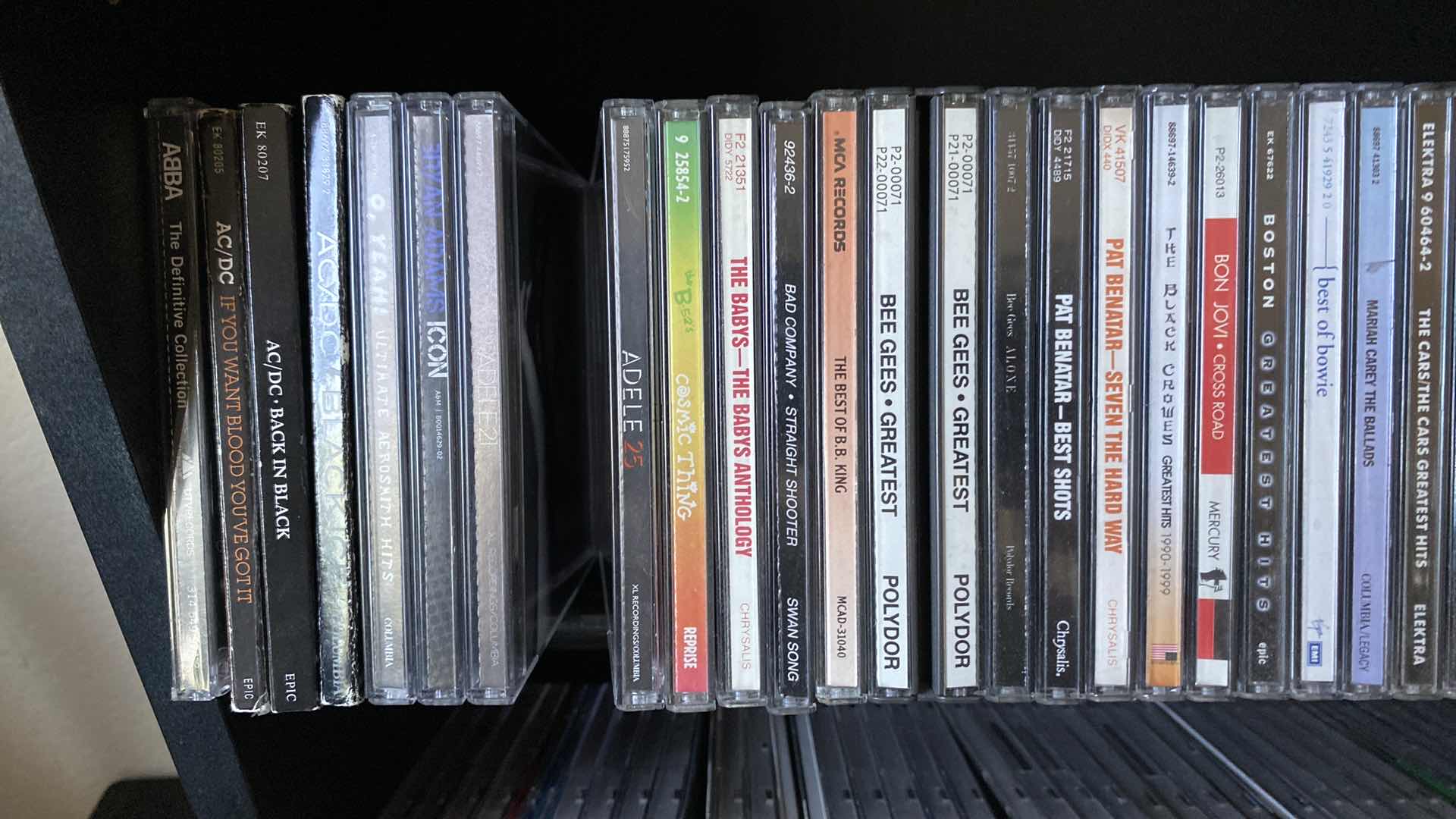 Photo 3 of CD STORAGE UNIT WITH ROCK CDS. 24x10x31H AC/DC JOURNEY PAT BENETAR BOSTON EAGLES PRINCE OZZY & MANY MORE