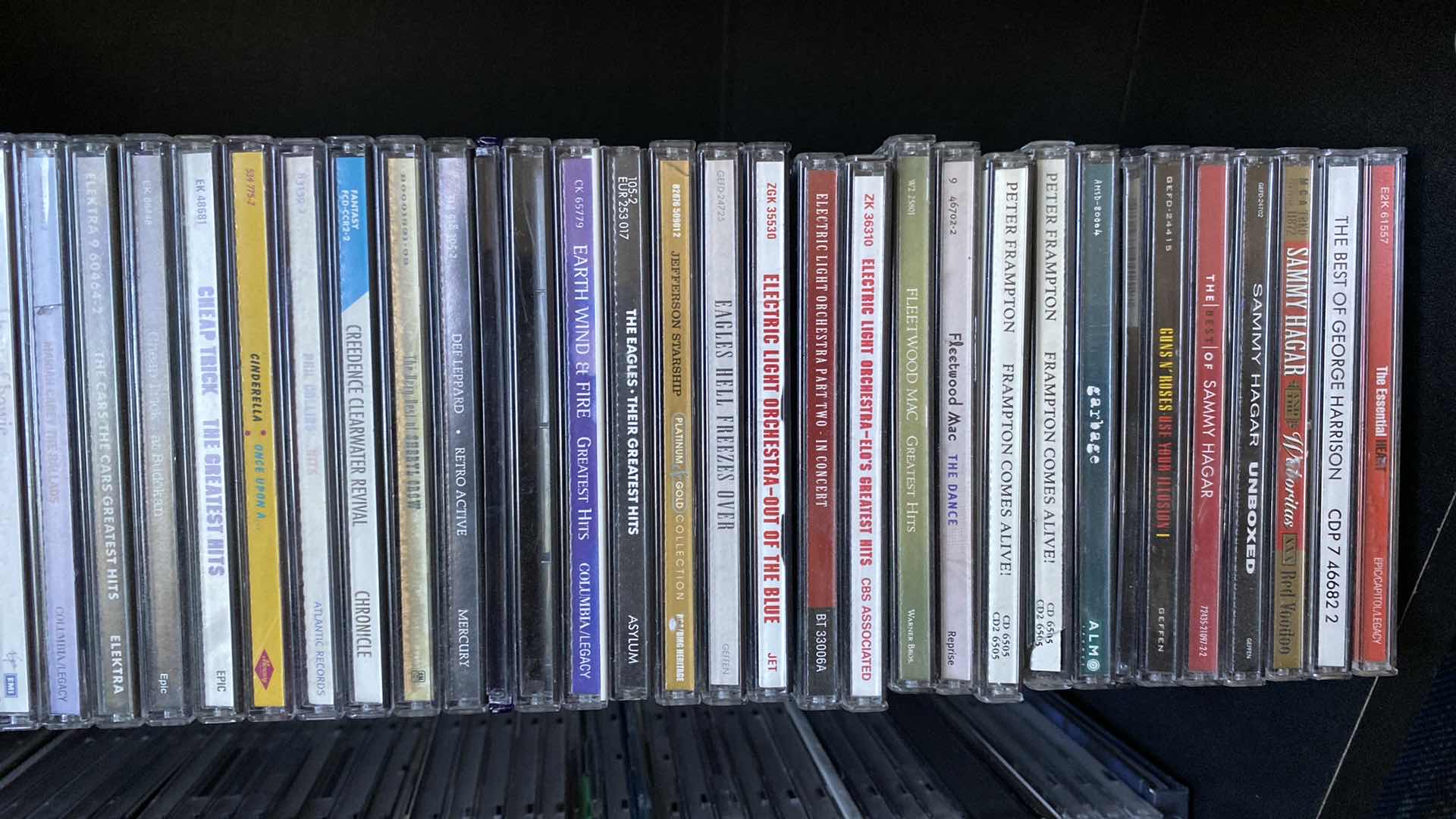 Photo 4 of CD STORAGE UNIT WITH ROCK CDS. 24x10x31H AC/DC JOURNEY PAT BENETAR BOSTON EAGLES PRINCE OZZY & MANY MORE