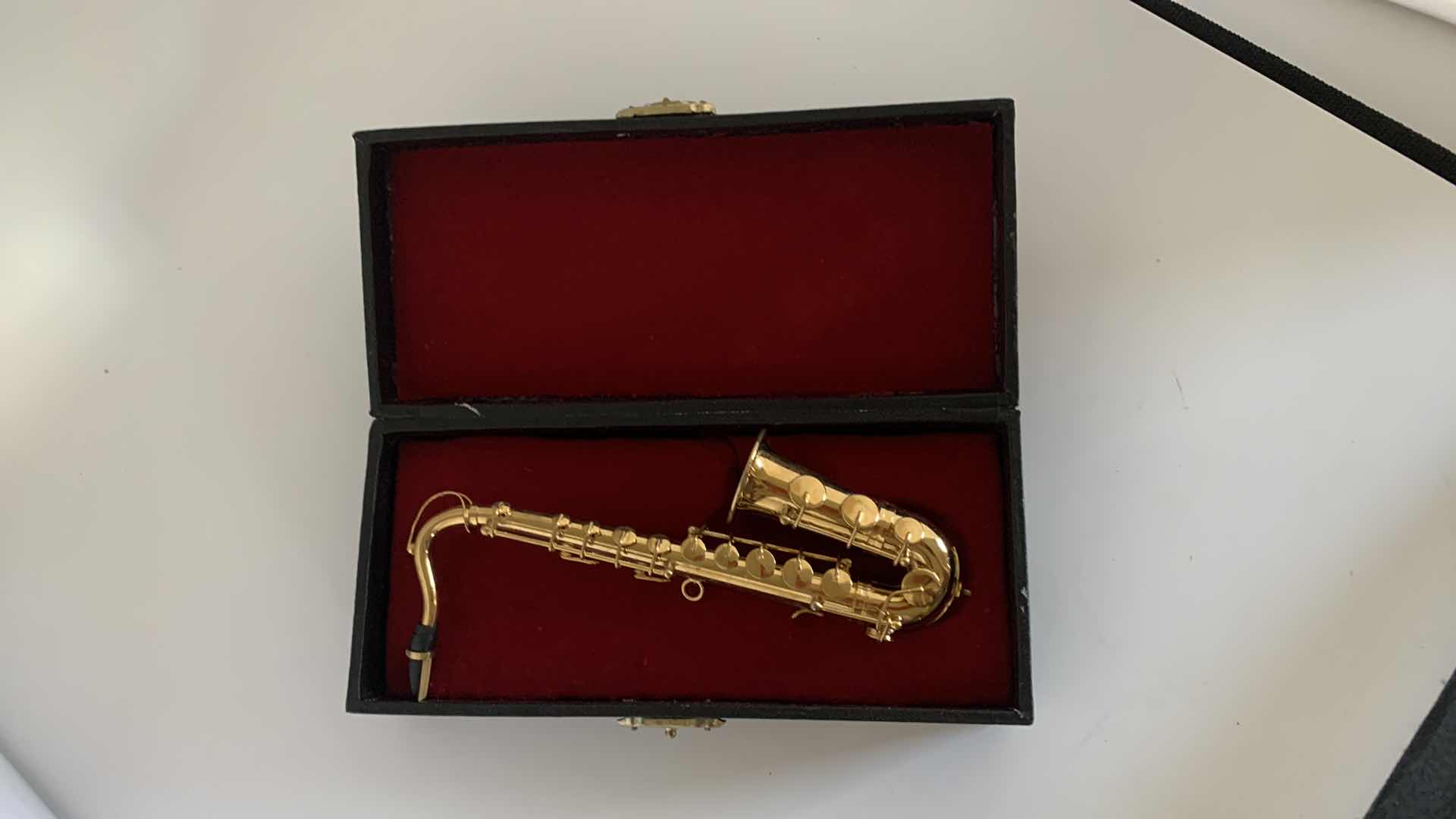 Photo 1 of MINIATURE SAXAPHONE DISPLAY W. CASE.
