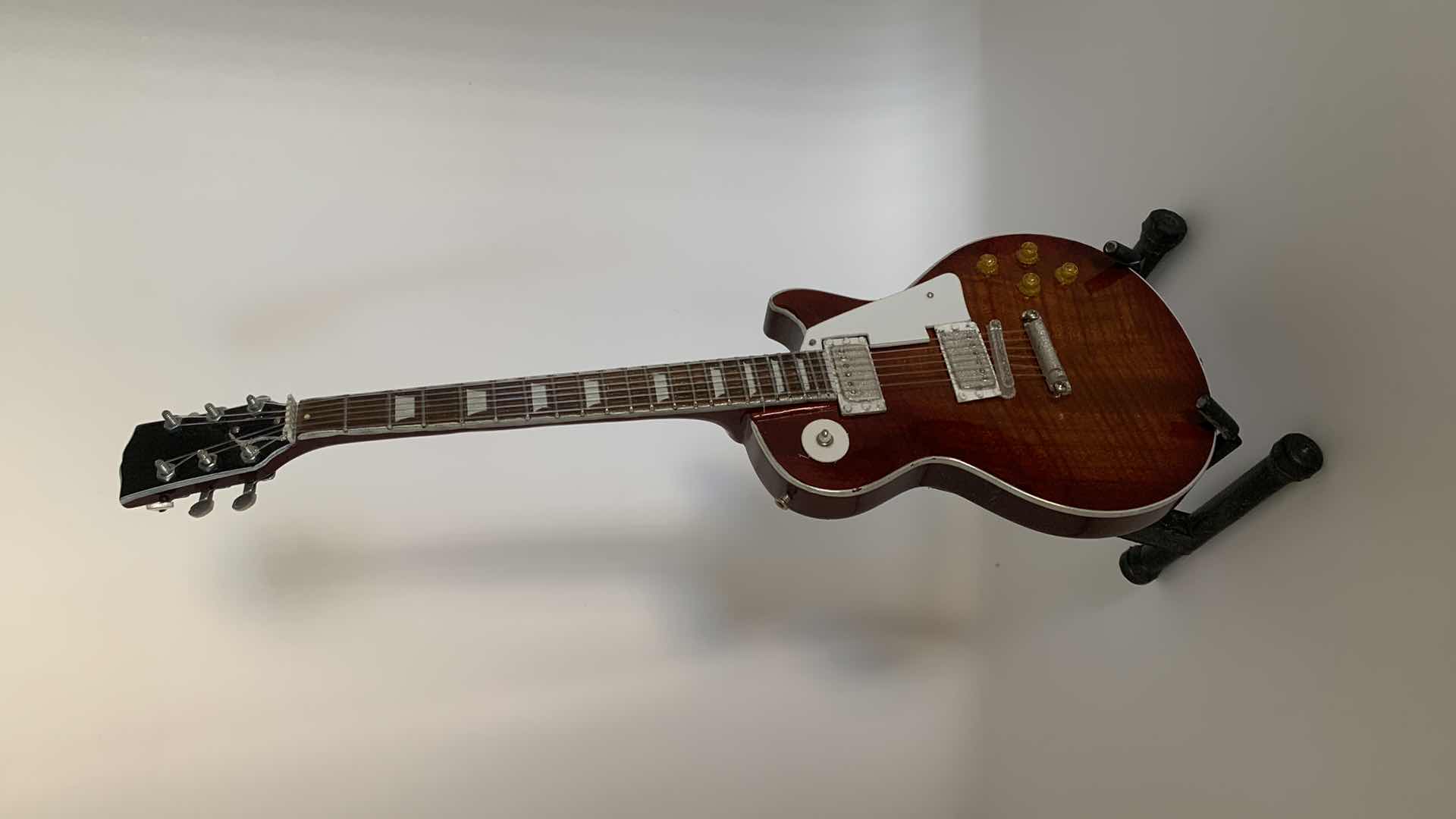 Photo 1 of MINIATURE ELECTRIC GUITAR DISPLAY. H.11”