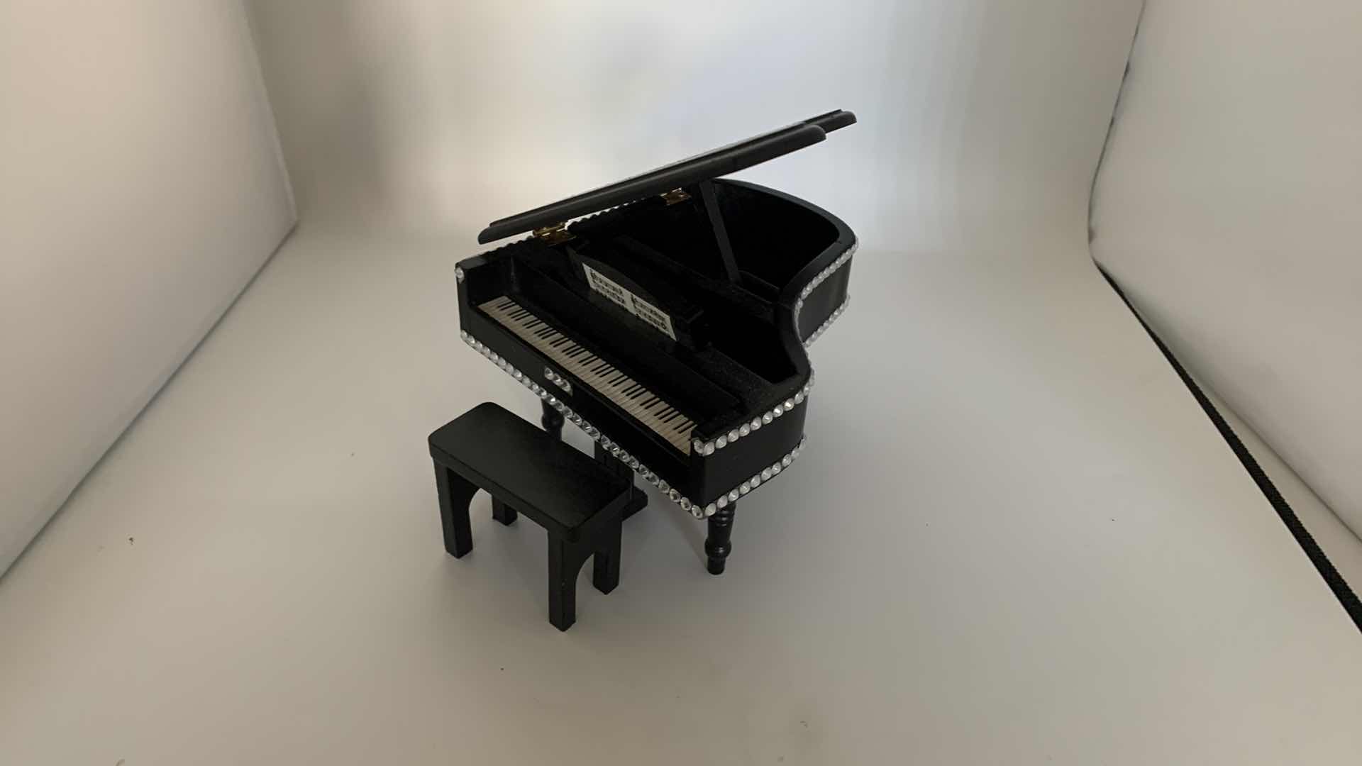 Photo 1 of HOBBY LOBBY MINIATURE PIANO DISPLAY.