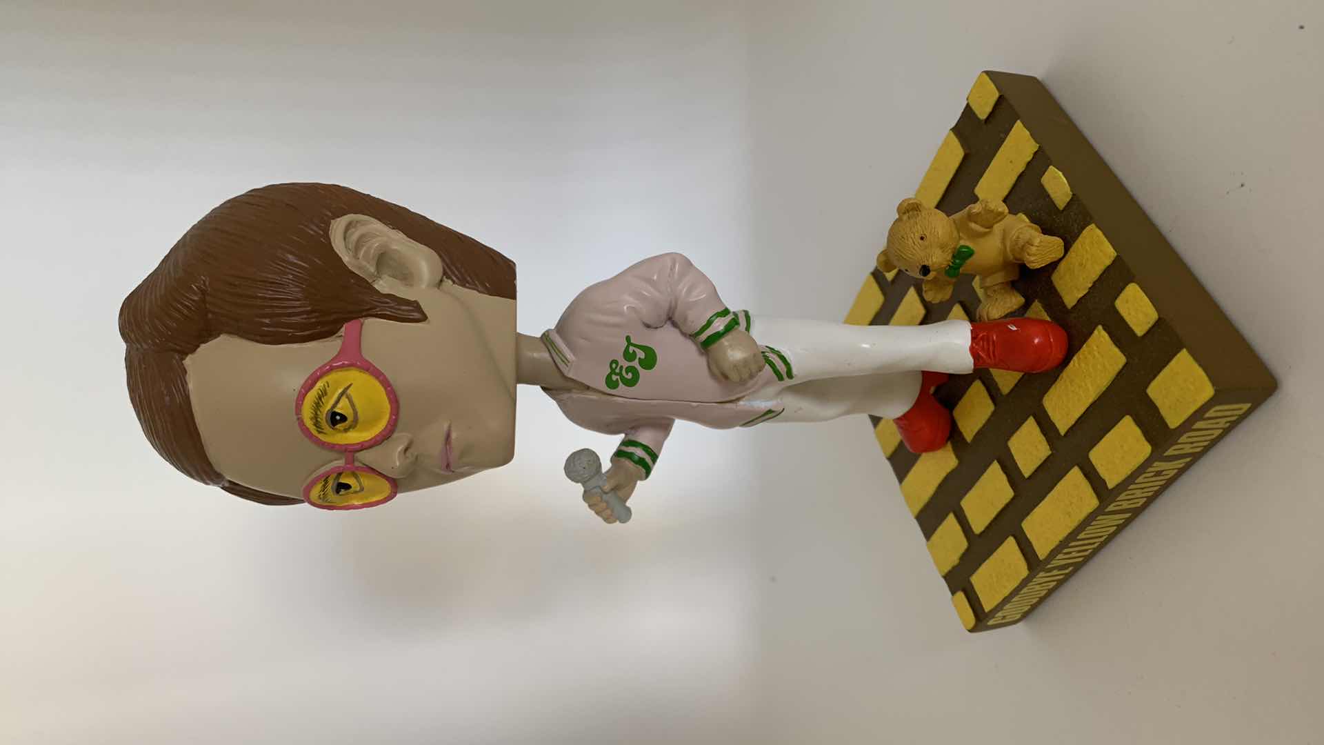 Photo 1 of ELTON JOHN (GOODBYE YELLOW BRICK ROAD) BOBBLE HEAD.