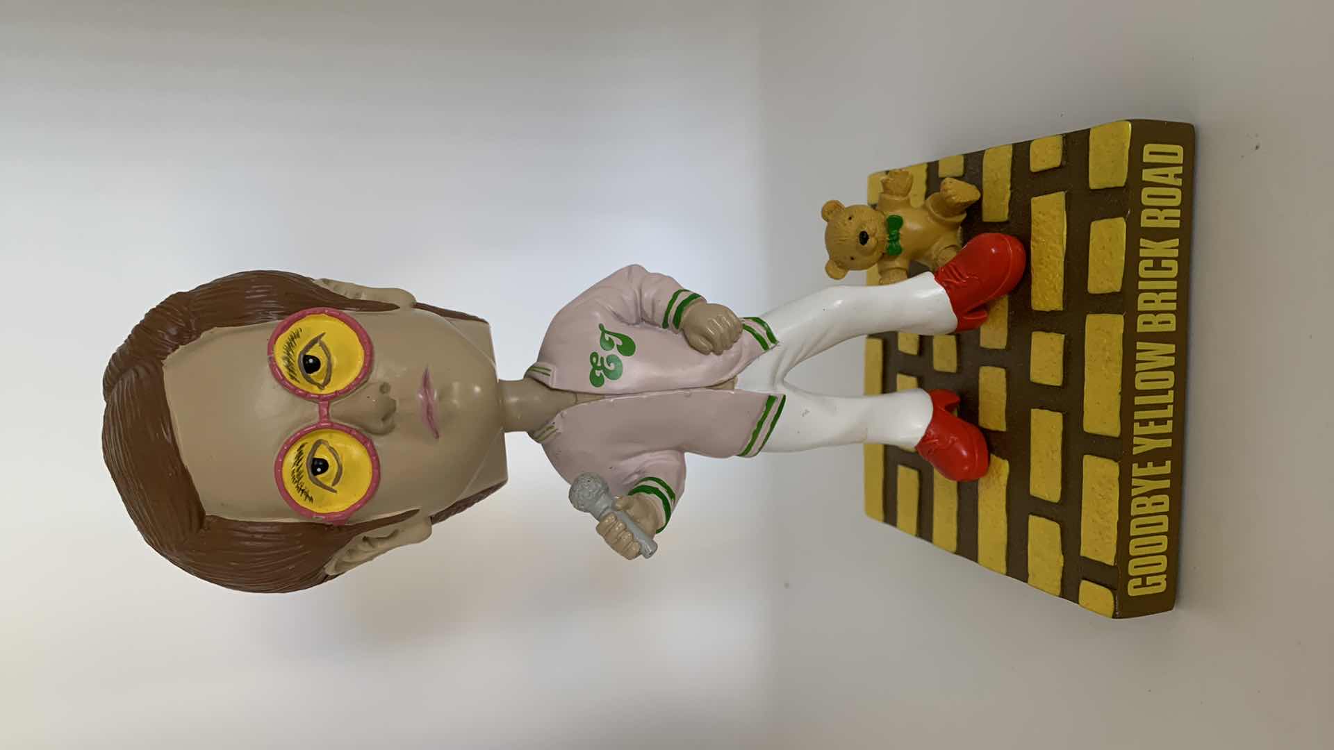 Photo 1 of ELTON JOHN (GOODBYE YELLOW BRICK ROAD) BOBBLE HEAD.