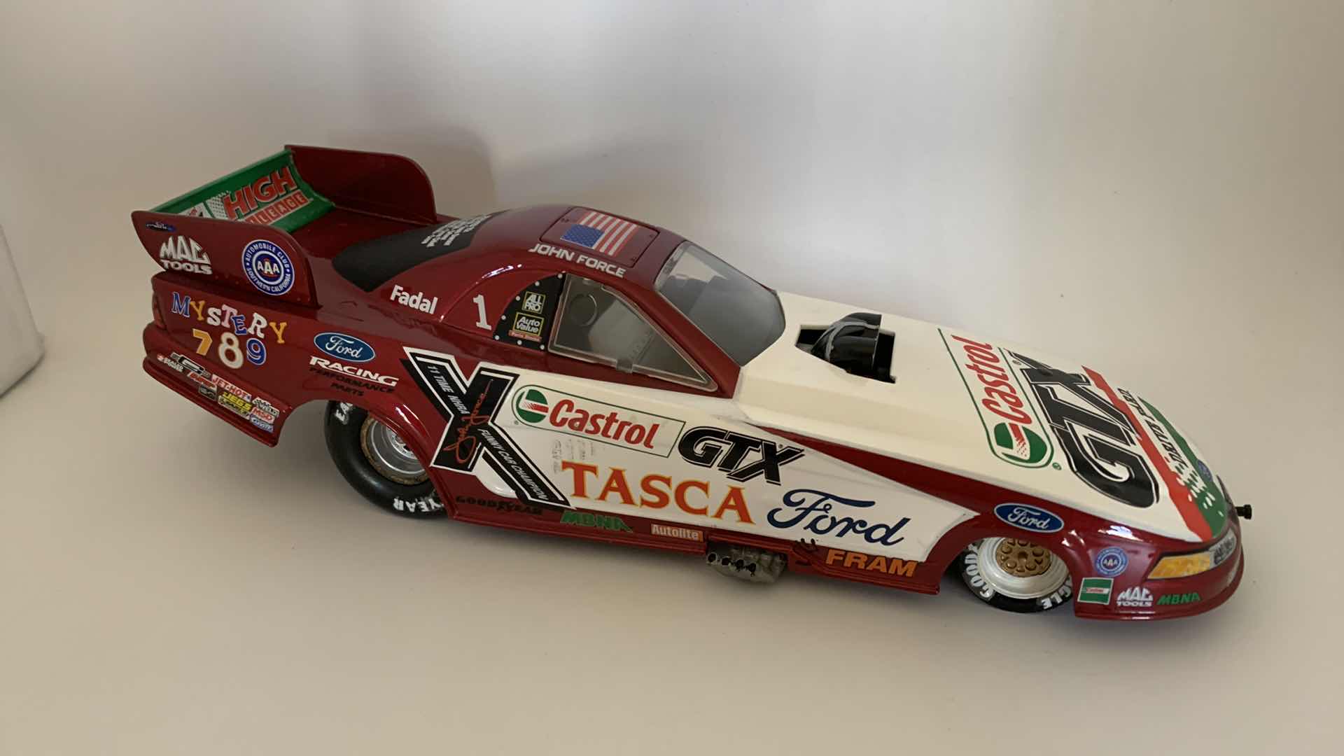 Photo 1 of CASTROL GTX JOHN FORCE DIE CAST CAR.