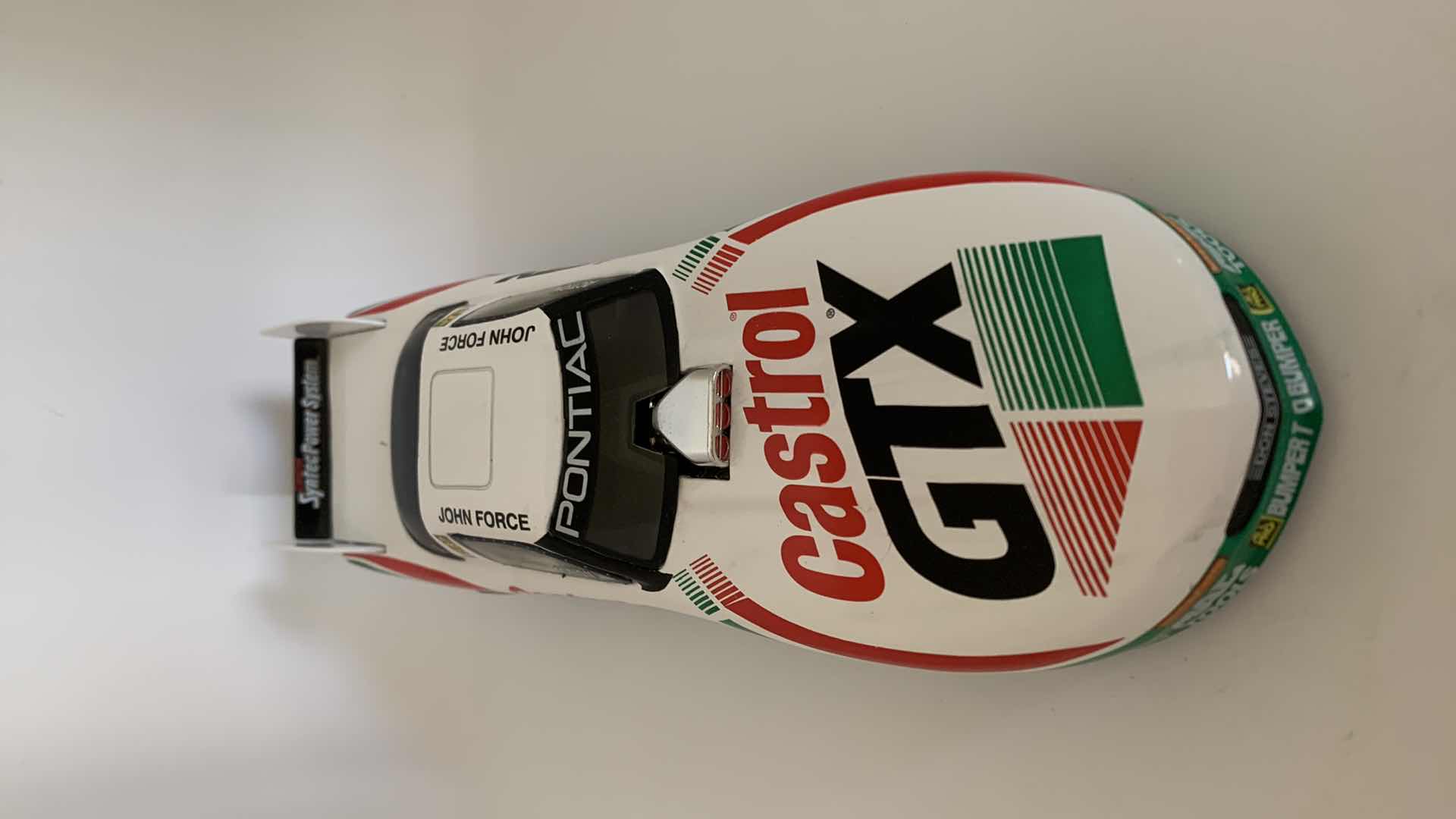 Photo 1 of CASTROL GTX JOHN FORCE DIE CAST CAR.