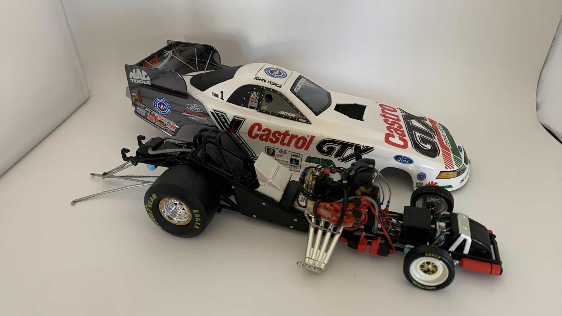 Photo 1 of CASTROL GTX JOHN FORCE DIE CAST CAR.
