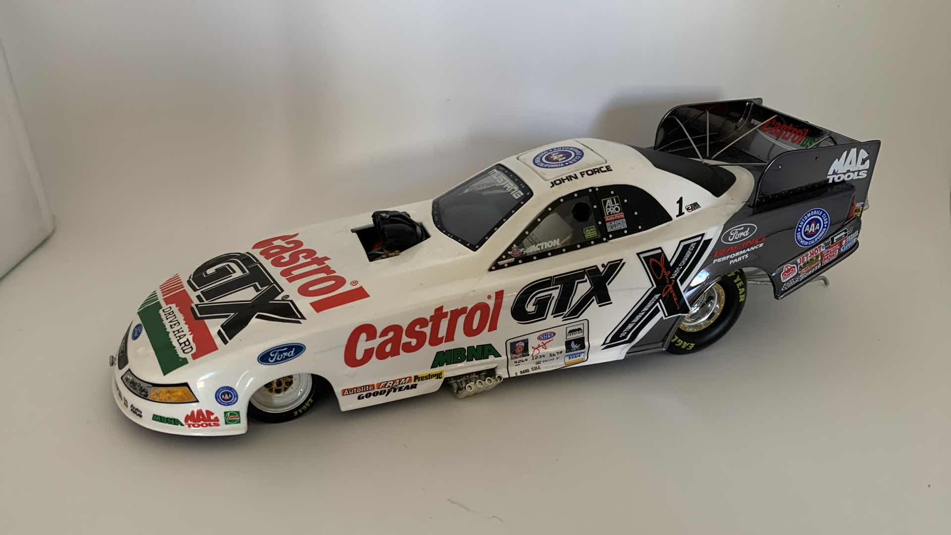 Photo 1 of CASTROL GTX JOHN FORCE DIE CAST CAR.