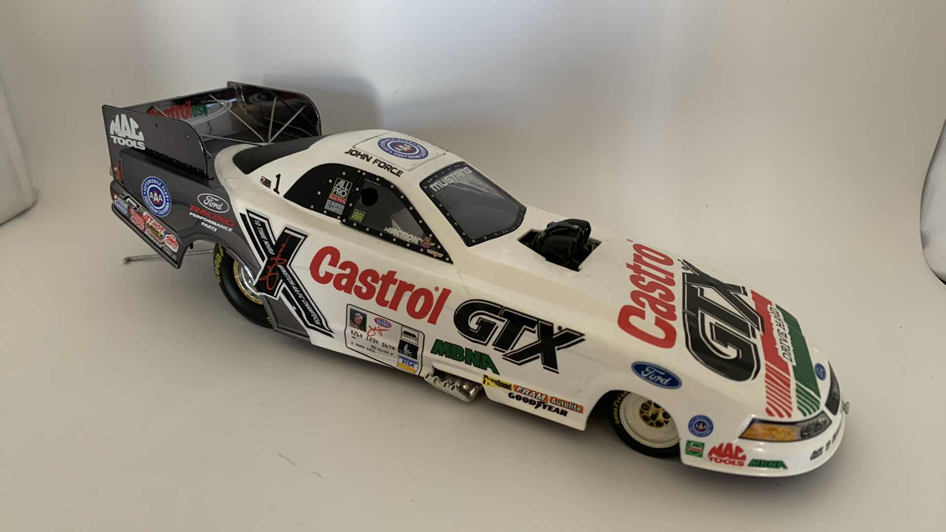 Photo 1 of CASTROL GTX JOHN FORCE DIE CAST CAR.