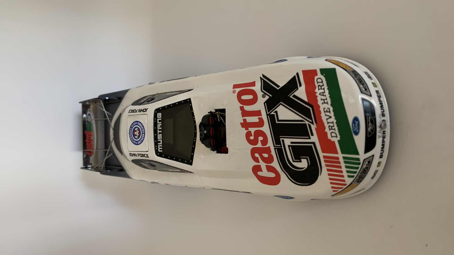 Photo 1 of CASTROL GTX JOHN FORCE DIE CAST CAR.