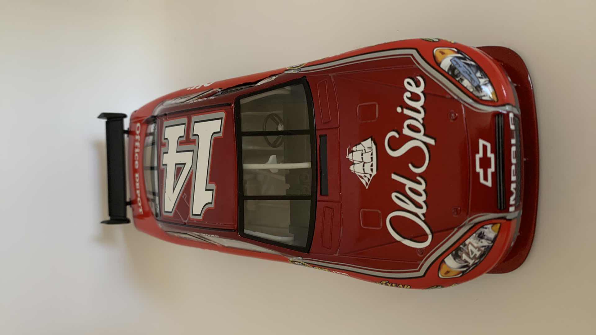 Photo 1 of OLD SPICE #14 TONY STEWART “SMOKE” DIE CAST RACE CAR.