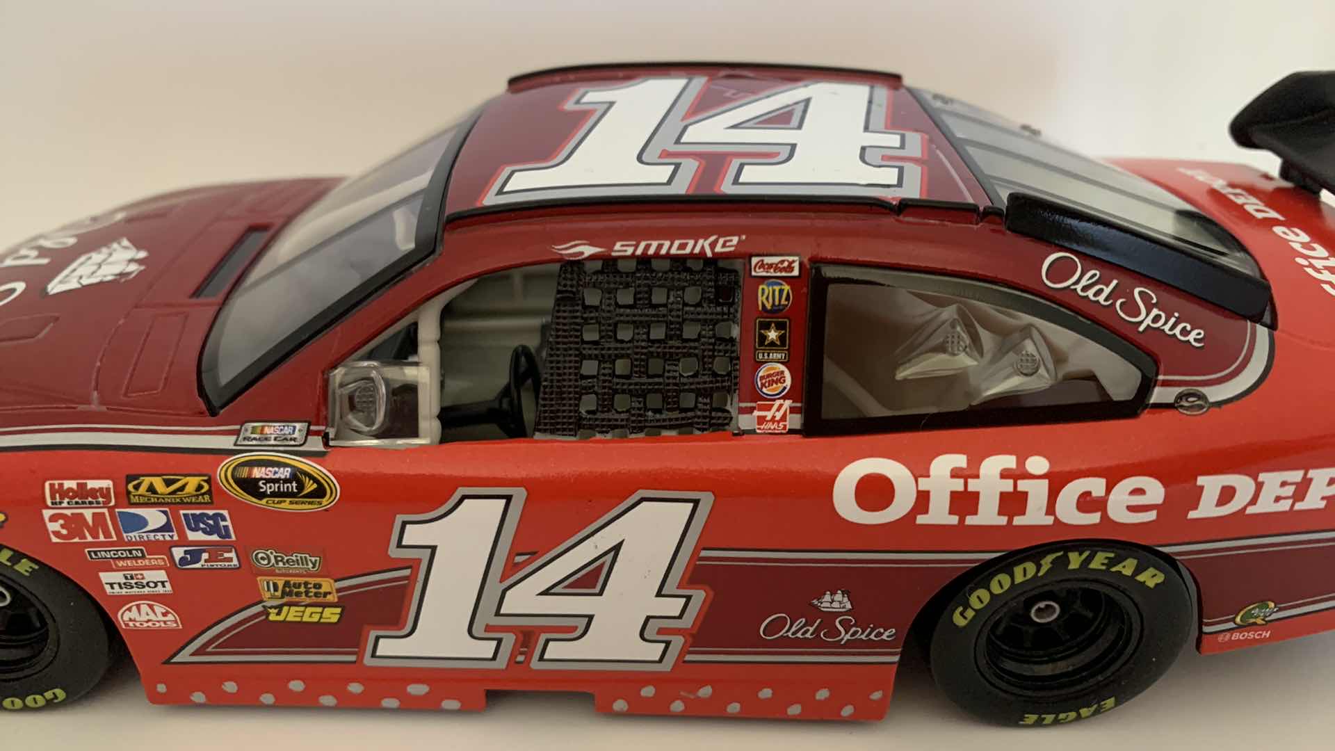 Photo 1 of OLD SPICE #14 TONY STEWART “SMOKE” DIE CAST RACE CAR.