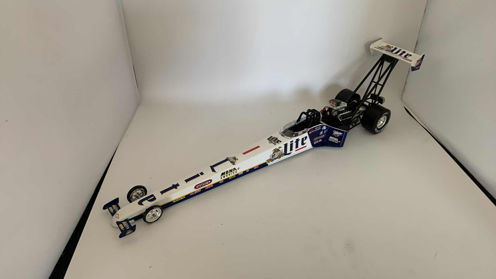 Photo 1 of MILLER LITE TOP FUEL DIE CAST RACE CAR.
