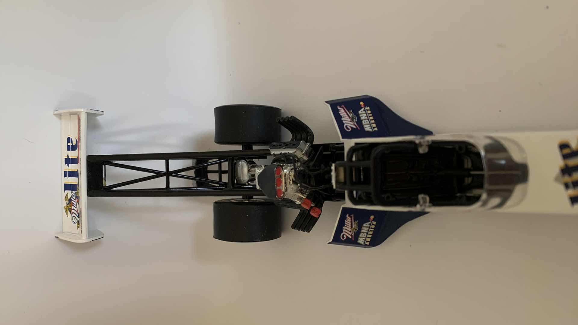 Photo 1 of MILLER LITE TOP FUEL DIE CAST RACE CAR.