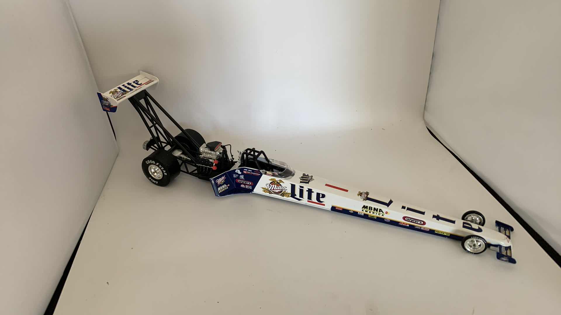 Photo 1 of MILLER LITE TOP FUEL DIE CAST RACE CAR.