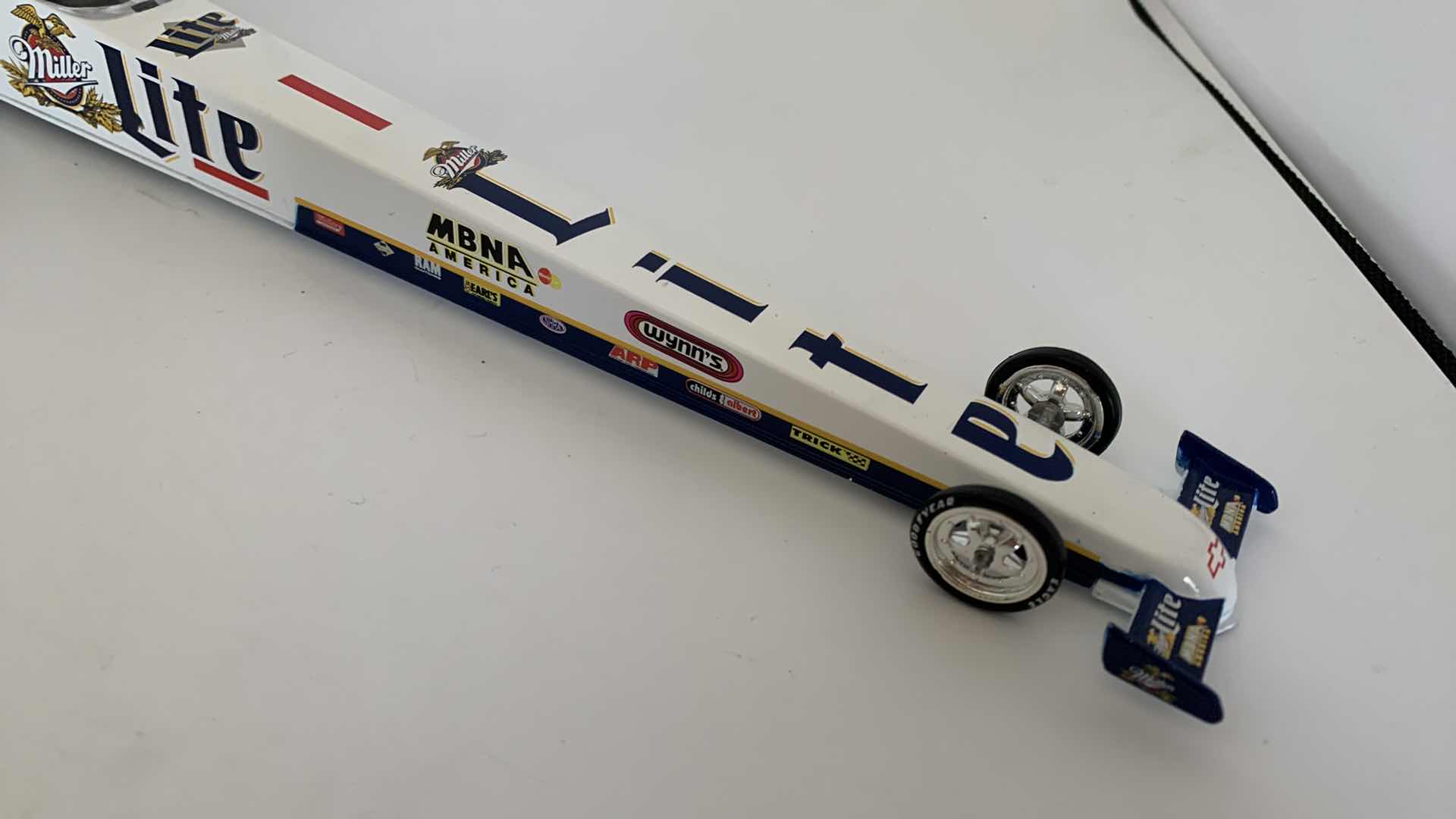 Photo 1 of MILLER LITE TOP FUEL DIE CAST RACE CAR.