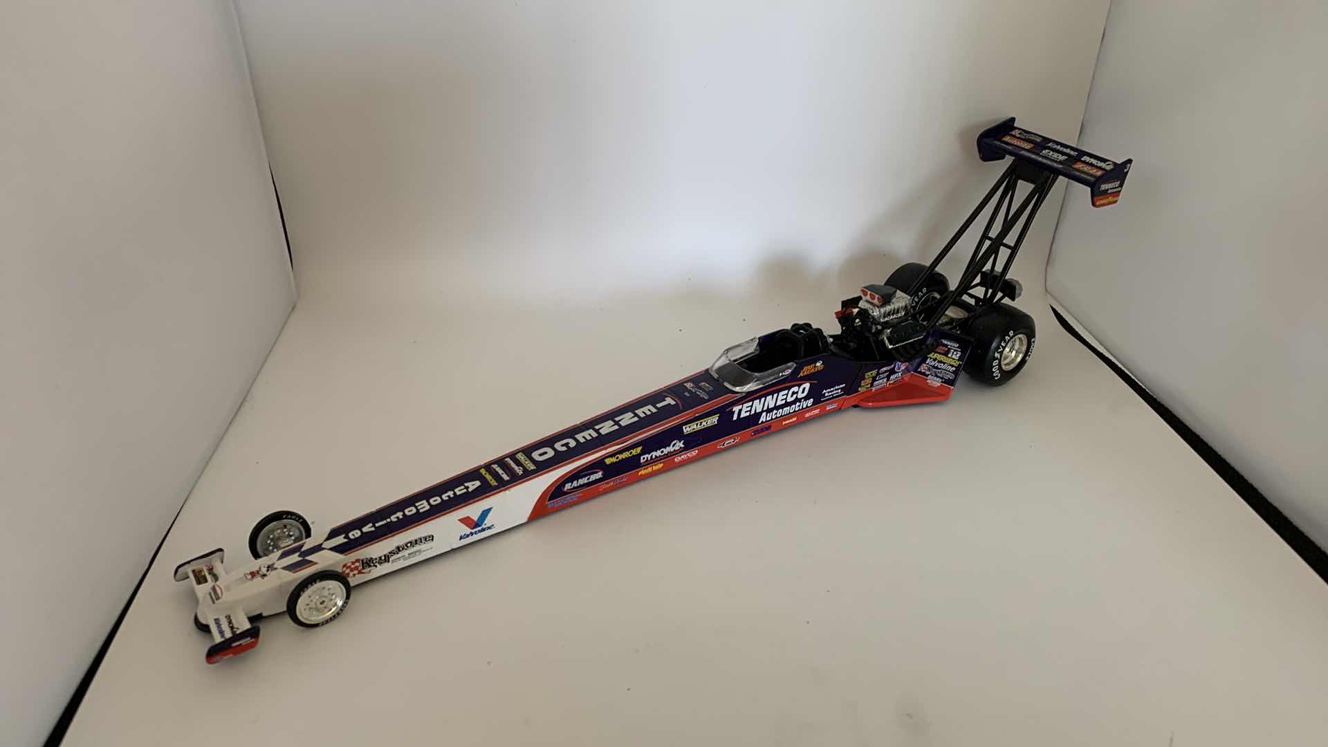 Photo 1 of TENNECO AUTOMOTIVE TOP FUEL DIE CAST RACE CAR.