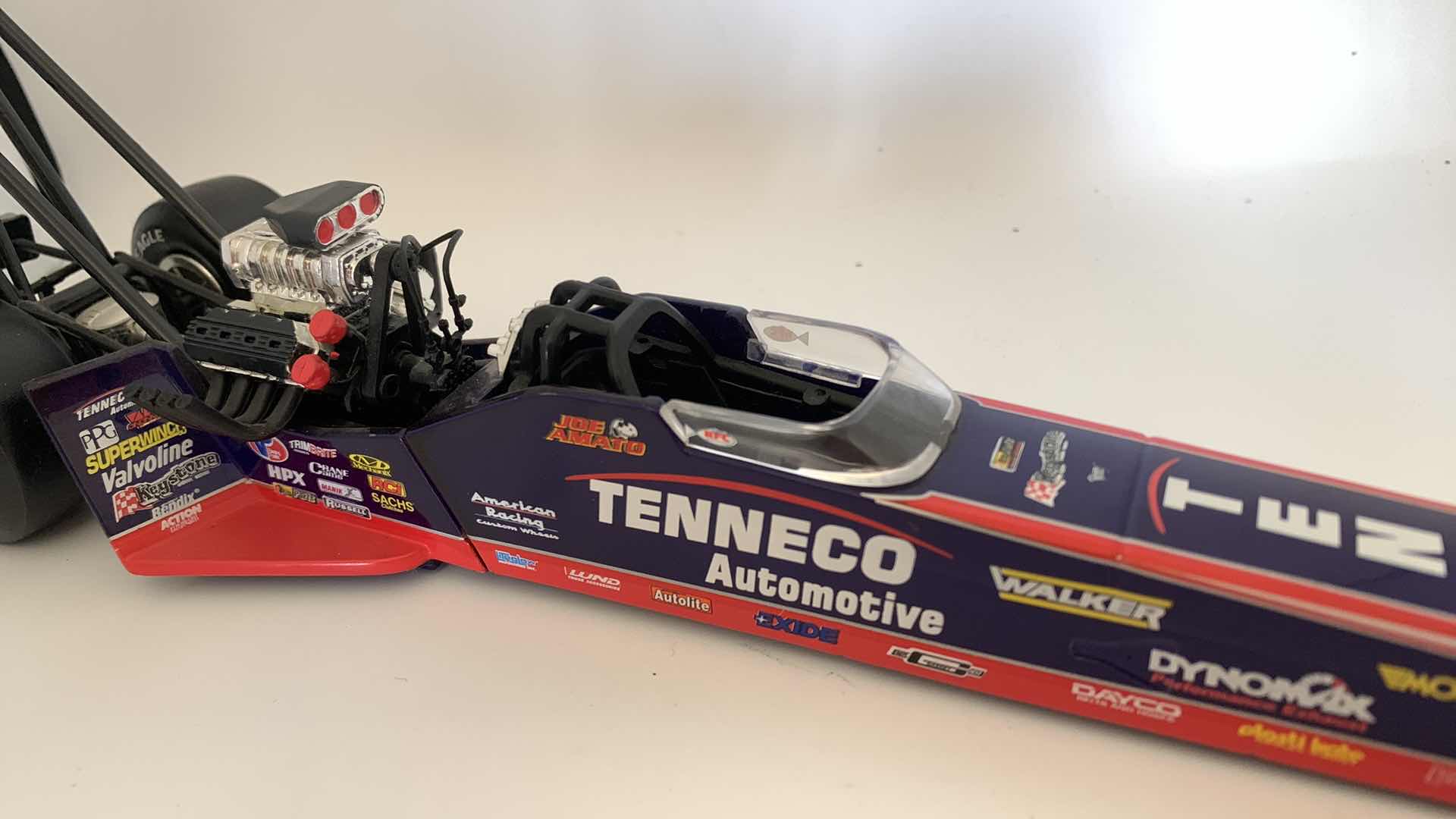 Photo 1 of TENNECO AUTOMOTIVE TOP FUEL DIE CAST RACE CAR.