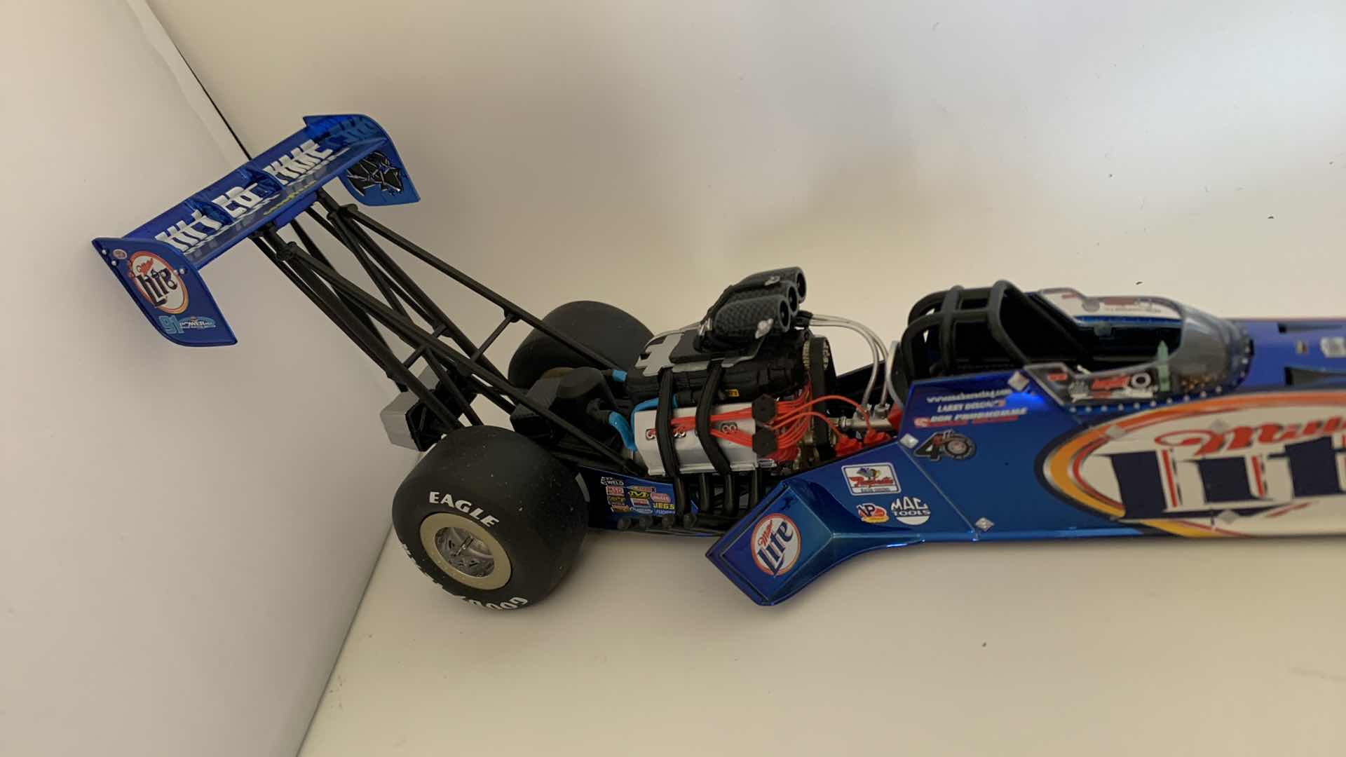 Photo 1 of MILLER LITE TOP FUEL DIE CAST RACE CAR.
