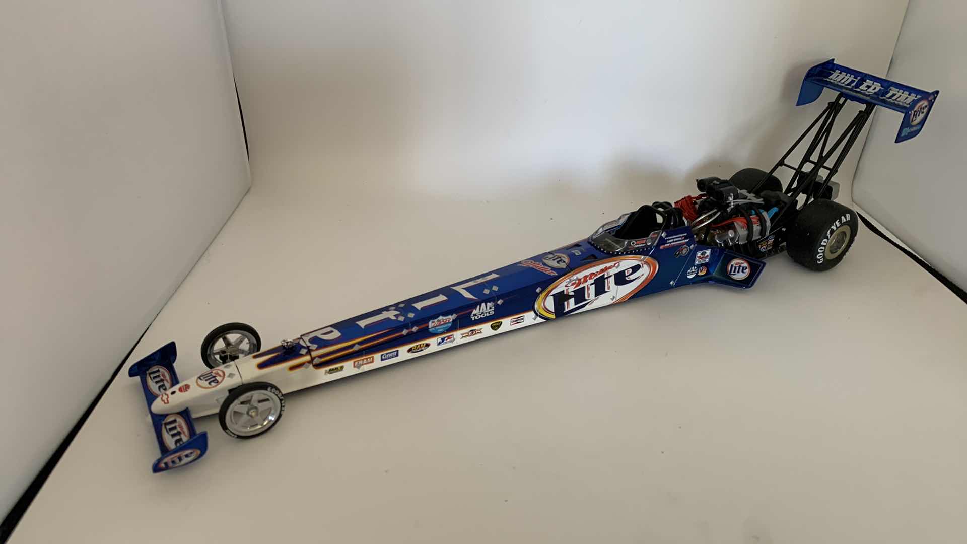 Photo 1 of MILLER LITE TOP FUEL DIE CAST RACE CAR.