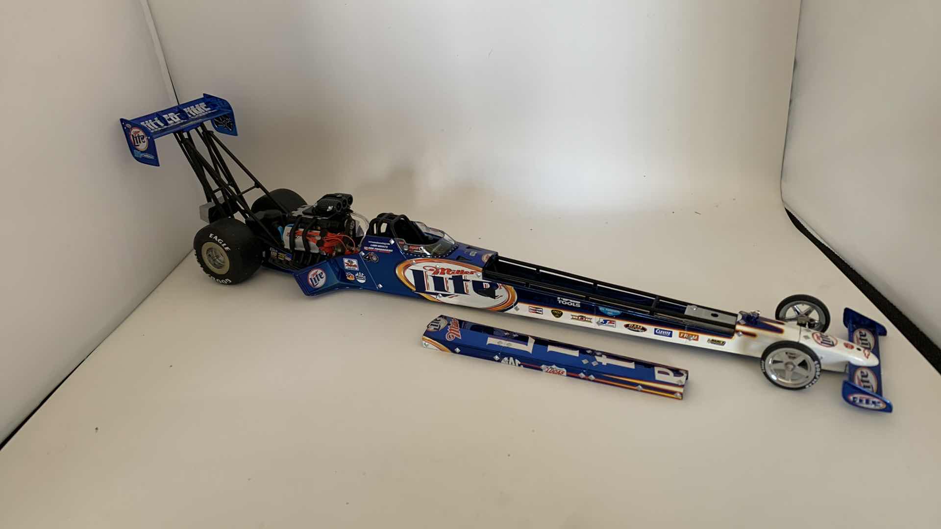 Photo 1 of MILLER LITE TOP FUEL DIE CAST RACE CAR.