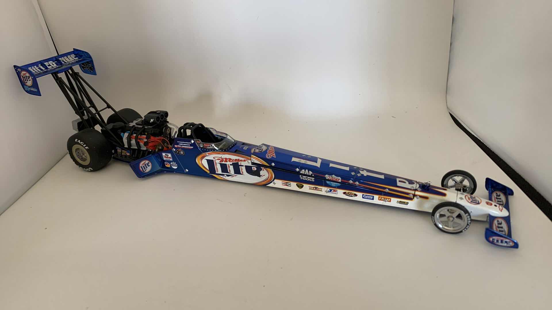 Photo 1 of MILLER LITE TOP FUEL DIE CAST RACE CAR.