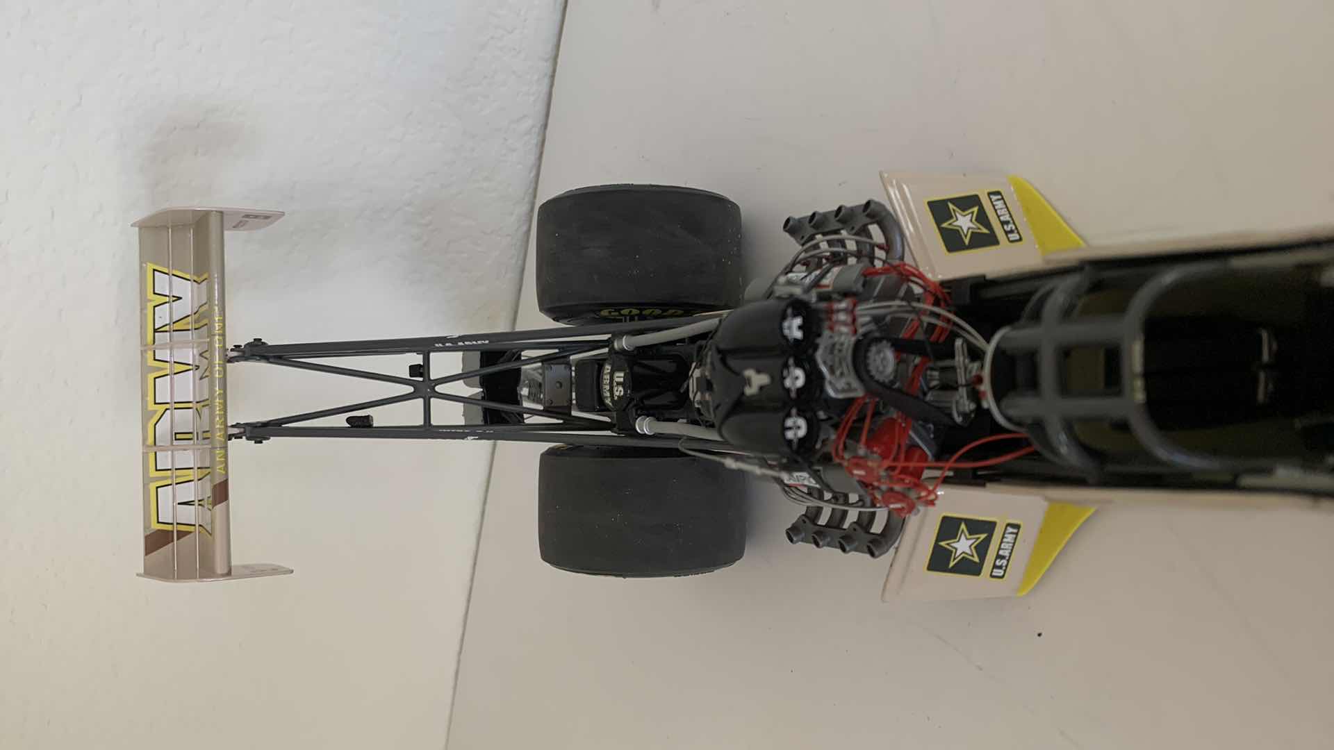Photo 1 of ARMY TOP FUEL DIE CAST RACE CAR.