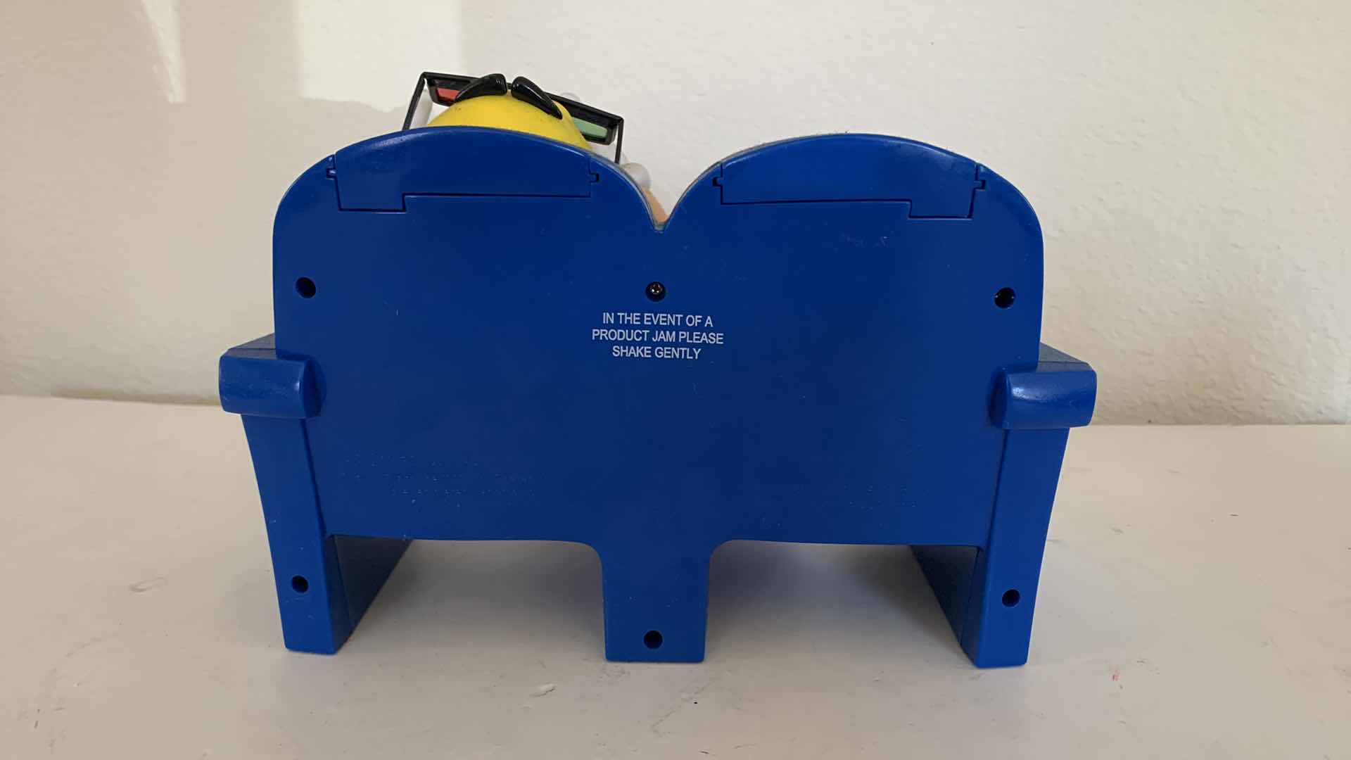 Photo 4 of M & Ms RED AND YELLOW 3D MOVIE CANDY DISPENSER COLLECTIBLE.