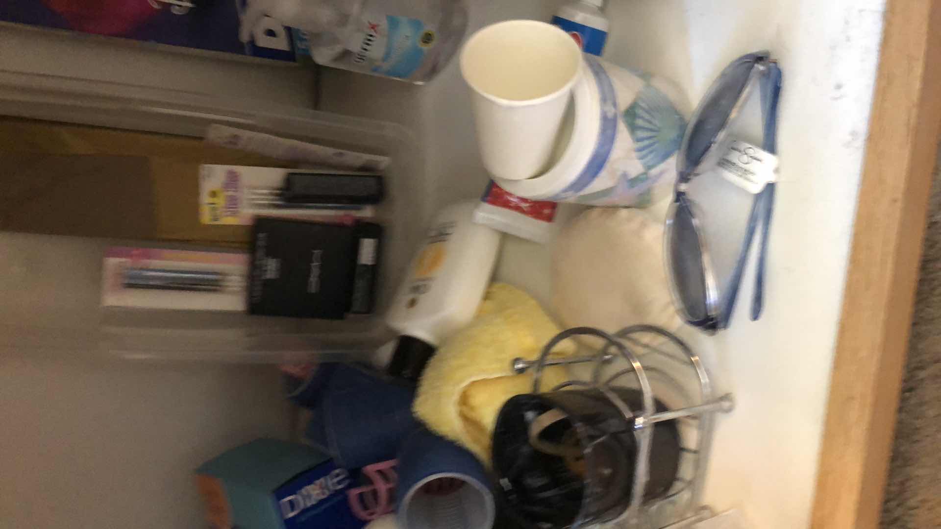 Photo 1 of CONTENTS UNDER BATHROOM SINK INCLUDING RUG, BLOW DRYERS, NEW MAKEUP, TOOTHPASTE AND MORE