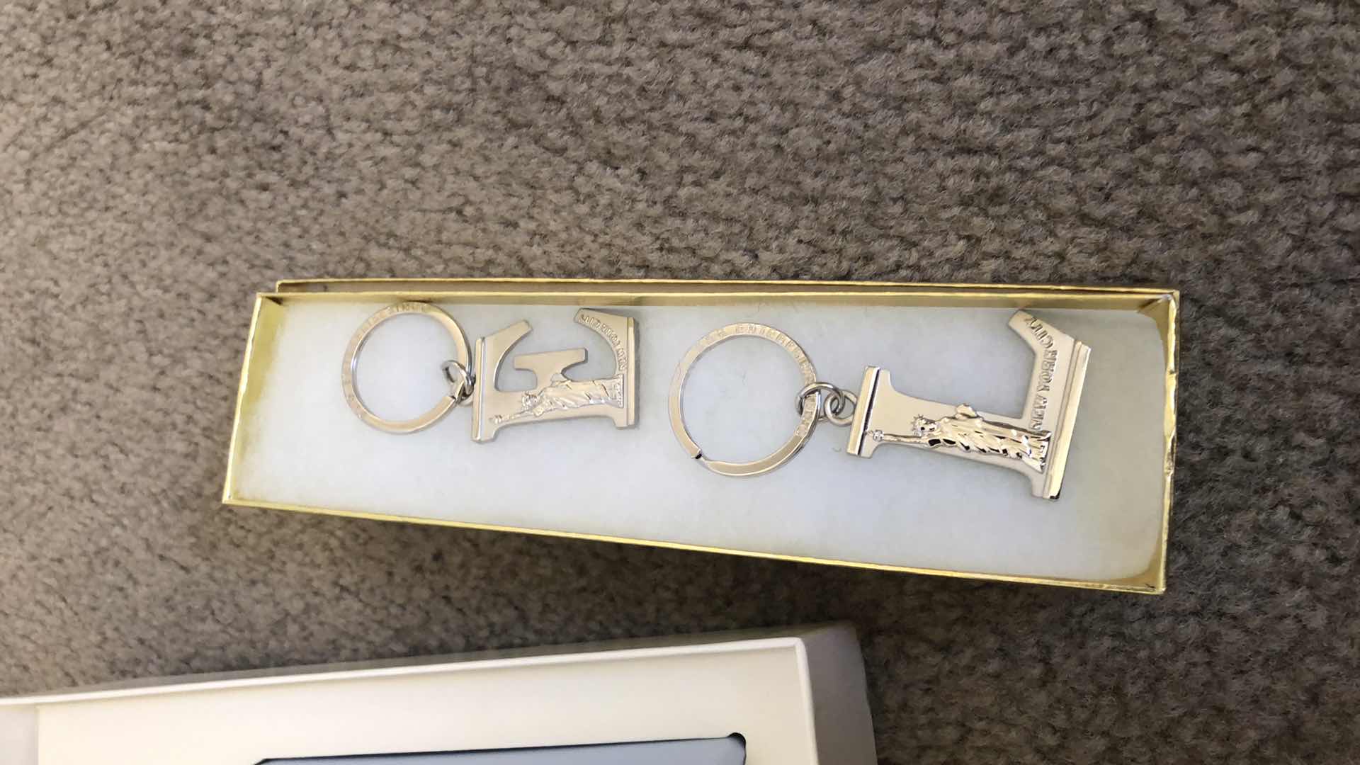 View 6 of NEW NEIMAN MARCUS CARD SET, NEW PARKER PEN, NEW ANN TAYLOR BODY SET, NEW BUTTERFLY ARTWORK AND TWO KEY FOBS.
