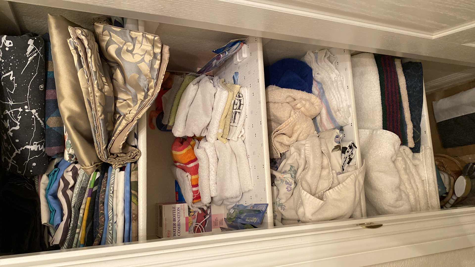 Photo 2 of CONTENTS OF LINEN CLOSET UPSTAIRS HALL BATH