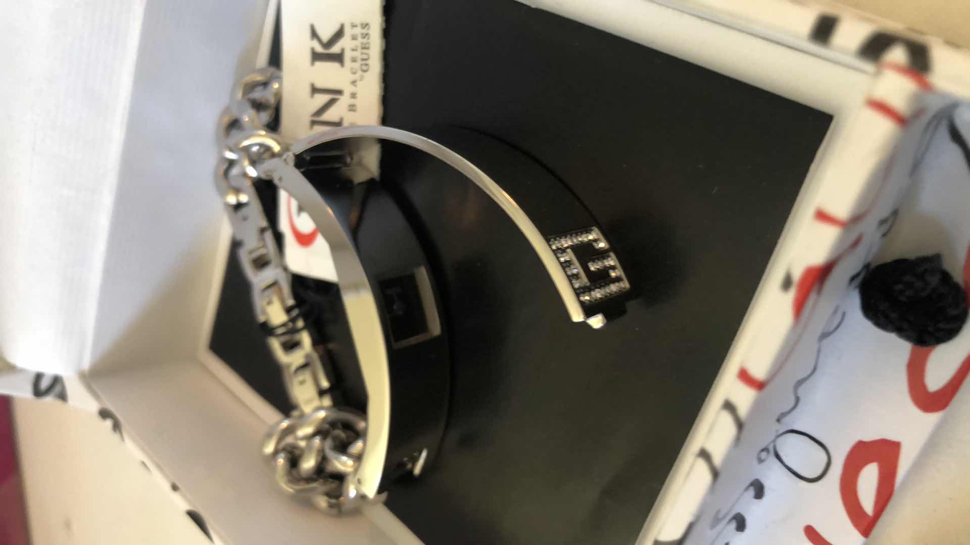 Photo 1 of NEW SILVER GUESS BRACELET/ WATCH