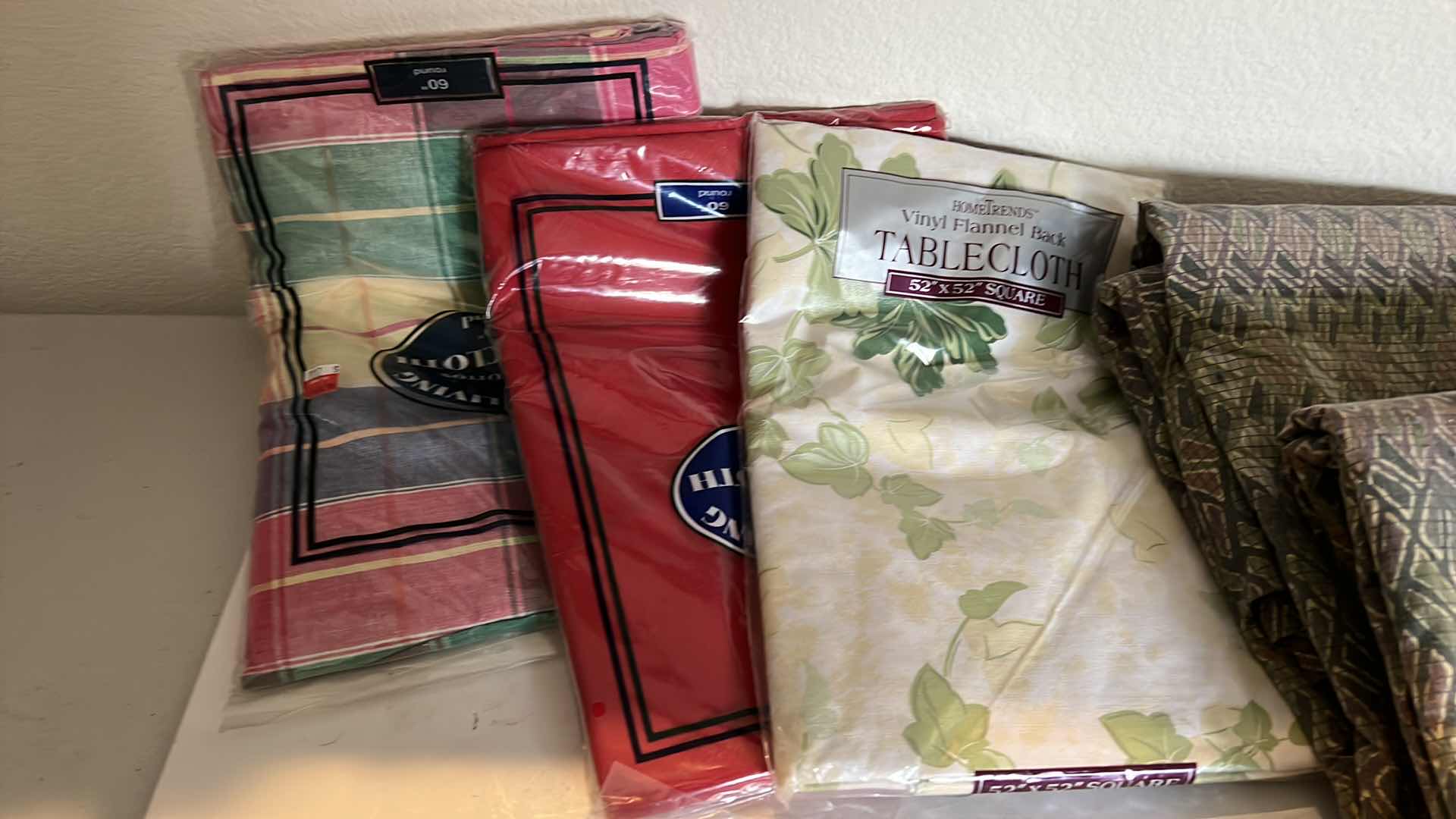 Photo 1 of 3-NEW TABLE CLOTHS, 8-PLACEMATS, SHEET SET