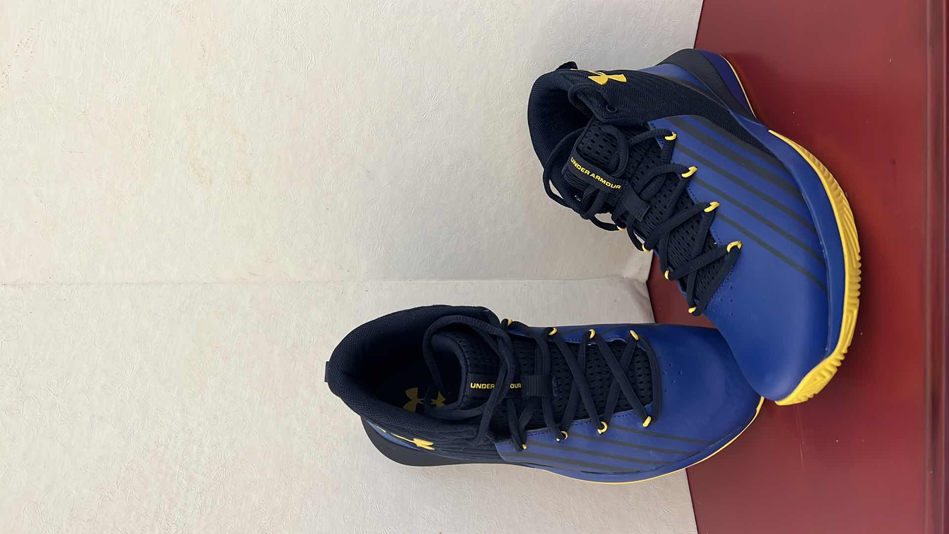 Photo 1 of LADIES UNDER ARMOUR ROYAL BLUE W YELLOW ATHLETIC SHOES (SIZE 7)